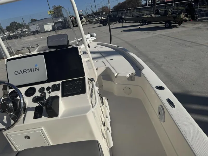 Slide: The Image of 2019 Skeeter SX 240 boat interior with Garmin navigation system. - 18