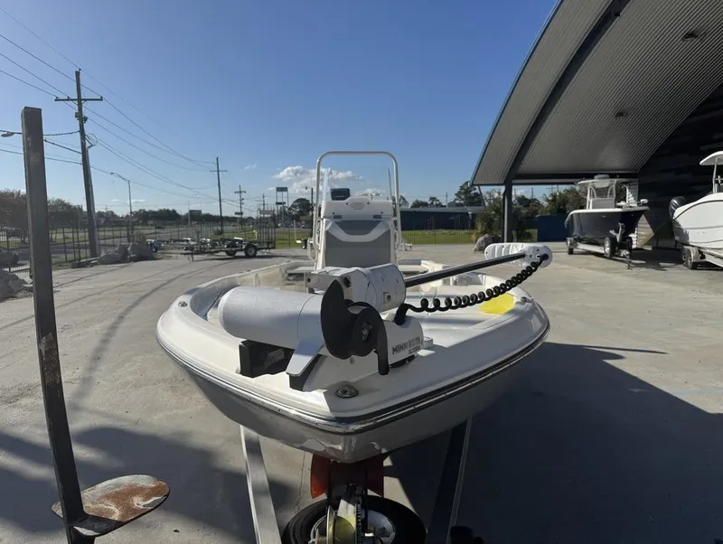Slide: The Image of 2019 Skeeter SX 240 boat on trailer, outdoor storage area, clear sky. - 3
