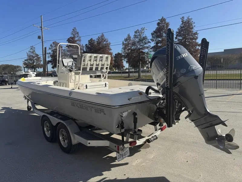 Slide: The Image of 2019 Skeeter SX 240 boat on trailer with Yamaha 300 outboard motor. - 6