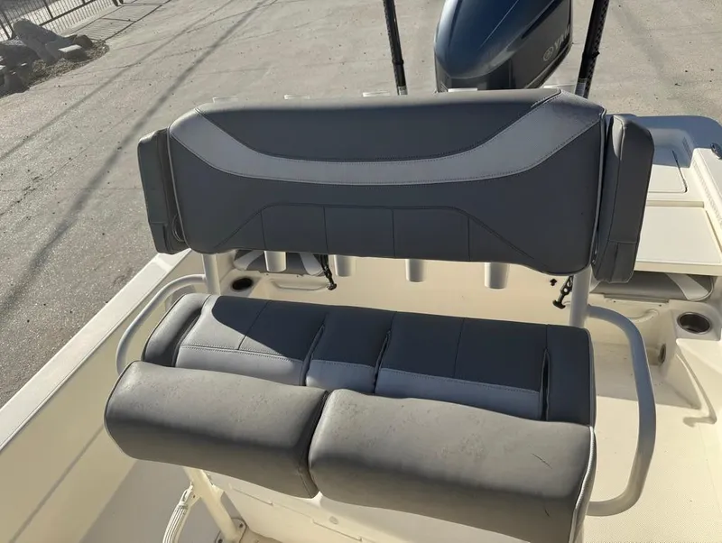 Slide: The Image of 2019 Skeeter SX 240 boat seat with gray upholstery, outdoor setting. - 8