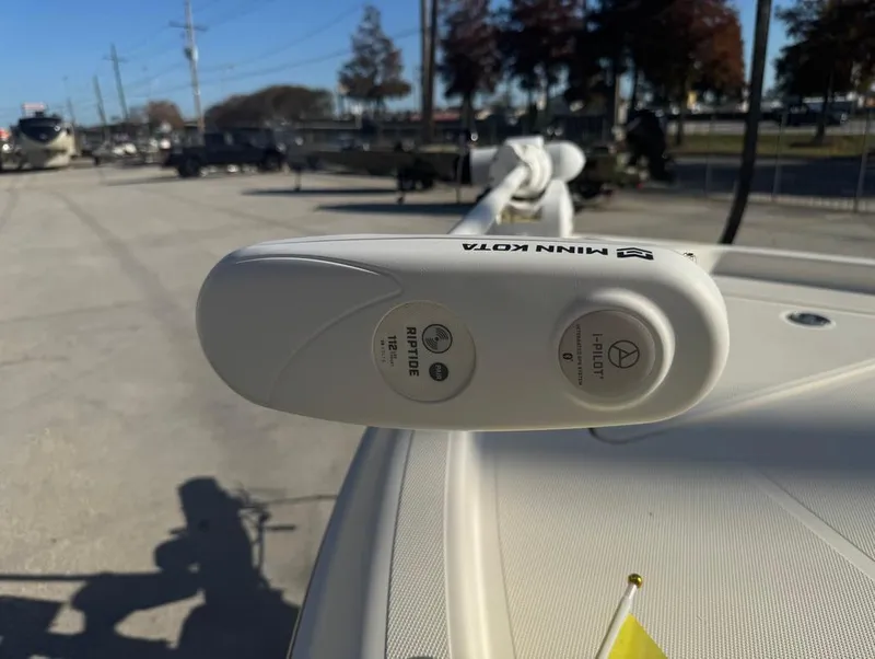 Slide: The Image of Minn Kota Riptide trolling motor on 2019 Skeeter SX 240 boat, outdoor setting. - 9