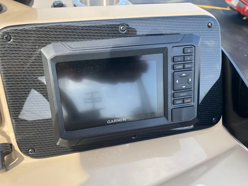 Slide: The Image of Garmin display on 2025 SunCatcher Select 322SS boat dashboard. - 15