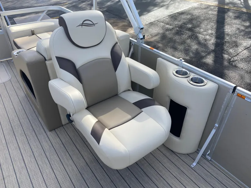 Slide: The Image of Luxurious seating on 2025 SunCatcher Select 322SS boat with cup holders. - 20