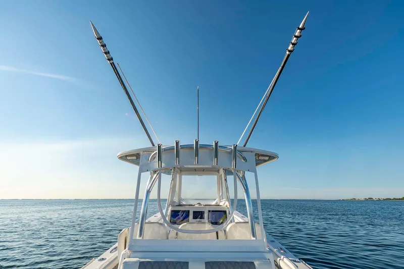 Slide: The Image of 2021 Front Runner 36 Center Console boat on open water, clear blue sky. - 15