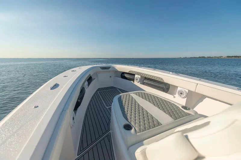 Slide: The Image of 2021 Front Runner 36 Center Console boat on calm ocean waters. - 26