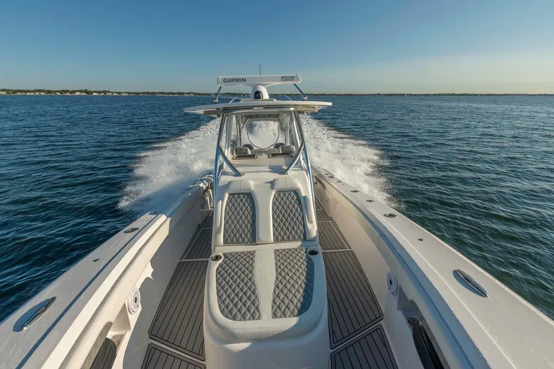 Slide: The Image of 2021 Front Runner 36 Center Console boat cruising on open water. - 28