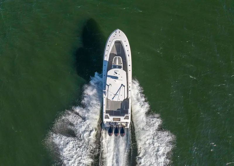 Slide: The Image of 2021 Front Runner 36 Center Console boat cruising on open water, aerial view. - 8