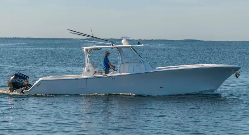 Slide: The Image of 2021 Front Runner 36 Center Console boat cruising on open water. - 9