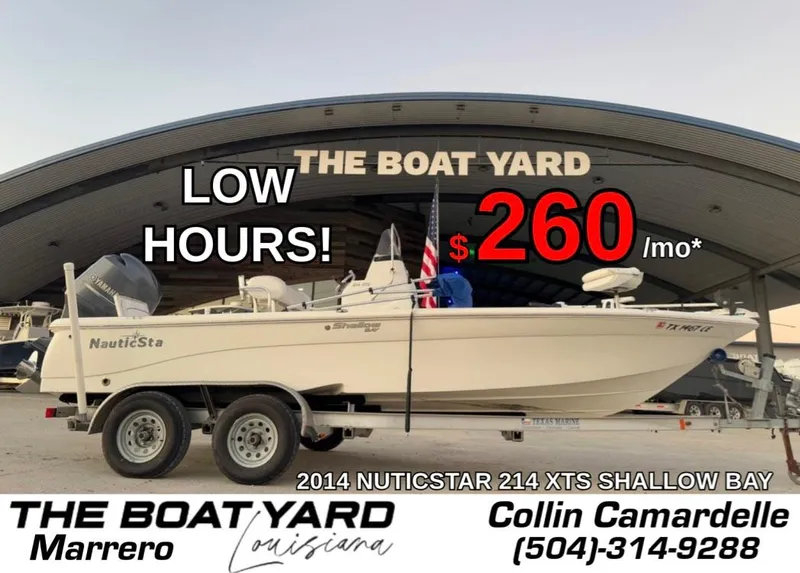 Slide: The Image of 2014 NauticStar 215 XTS Shallow Bay boat for sale, low hours, $260/month. - 1