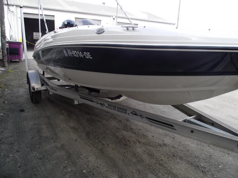 Slide: The Image of 2016 Stingray 182 SC boat on trailer. - 2