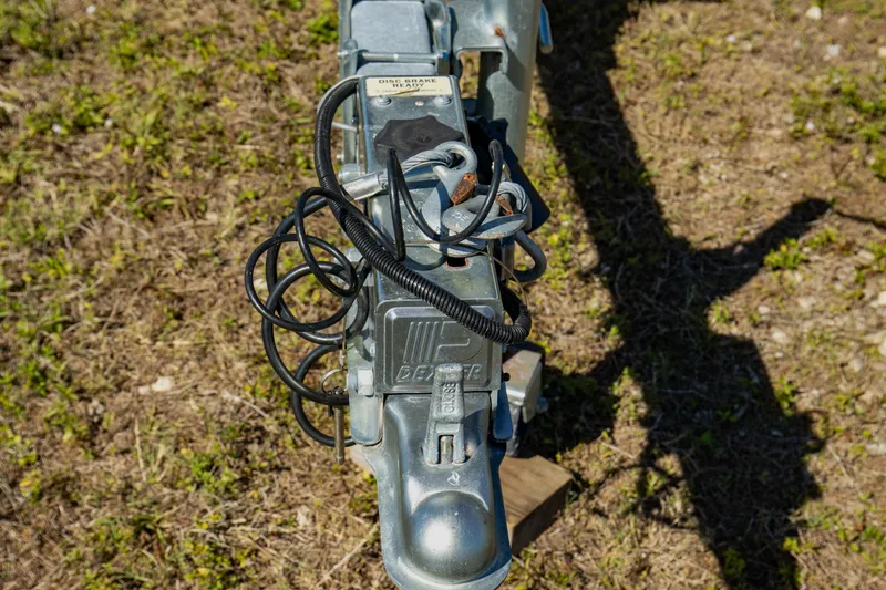 Slide: The Image of Close-up of a 2021 Pioneer 202 Islander trailer hitch on grass. - 29