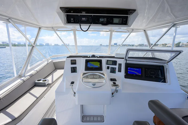 Slide: The Image of Viking 50 Convertible 2000 yacht helm with navigation equipment and ocean view. - 40
