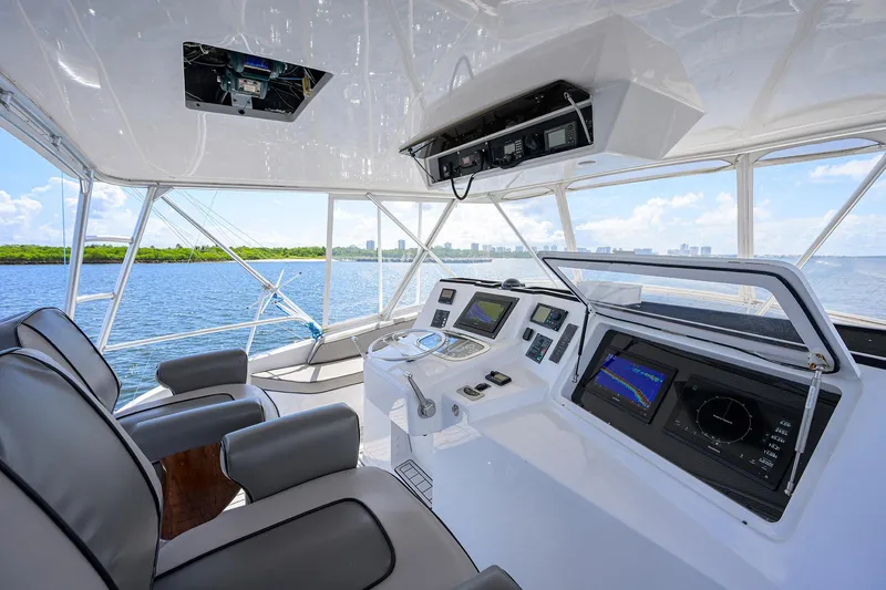 Slide: The Image of Interior of 2000 Viking 50 Convertible yacht with modern navigation equipment and ocean view. - 41