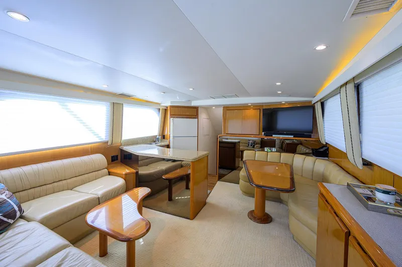 Slide: The Image of Luxurious interior of 2000 Viking 50 Convertible yacht with modern furnishings. - 6