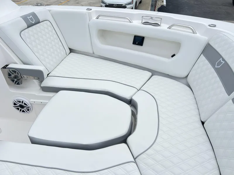 Slide: The Image of Luxurious seating on 2025 Sea Fox 288 Traveler boat with white quilted upholstery. - 13