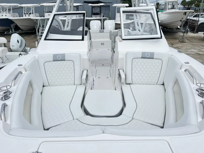 Slide: The Image of 2025 Sea Fox 288 Traveler boat with luxurious white seating and modern design. - 19