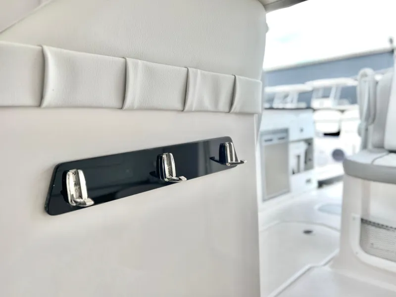 Slide: The Image of Interior view of 2025 Sea Fox 288 Traveler boat, featuring sleek chrome hooks. - 24