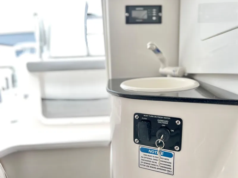 Slide: The Image of 2025 Sea Fox 288 Traveler boat interior with sink and control panel. - 25