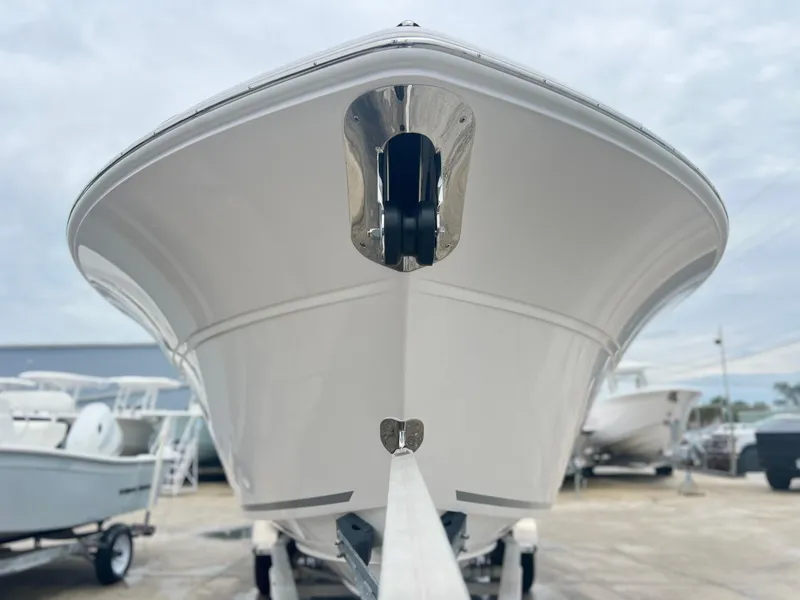 Slide: The Image of 2025 Sea Fox 288 Traveler boat, front view, displayed outdoors on a trailer. - 3