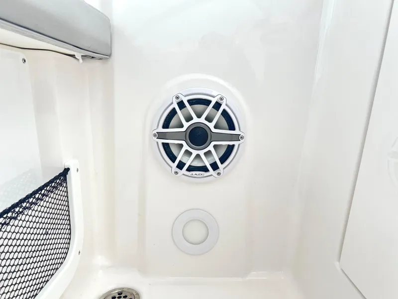 Slide: The Image of 2025 Sea Fox 288 Traveler boat interior with speaker and netted storage. - 42