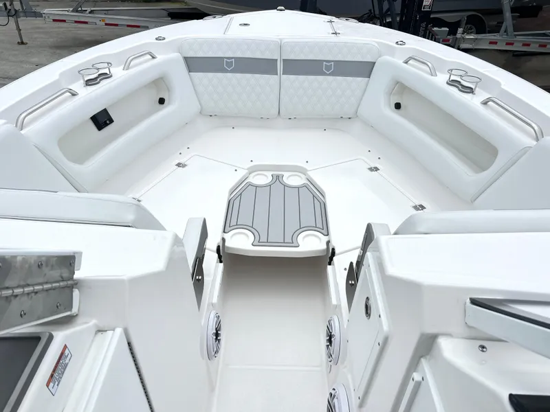 Slide: The Image of 2025 Sea Fox 288 Traveler boat interior with white seating and gray accents. - 8