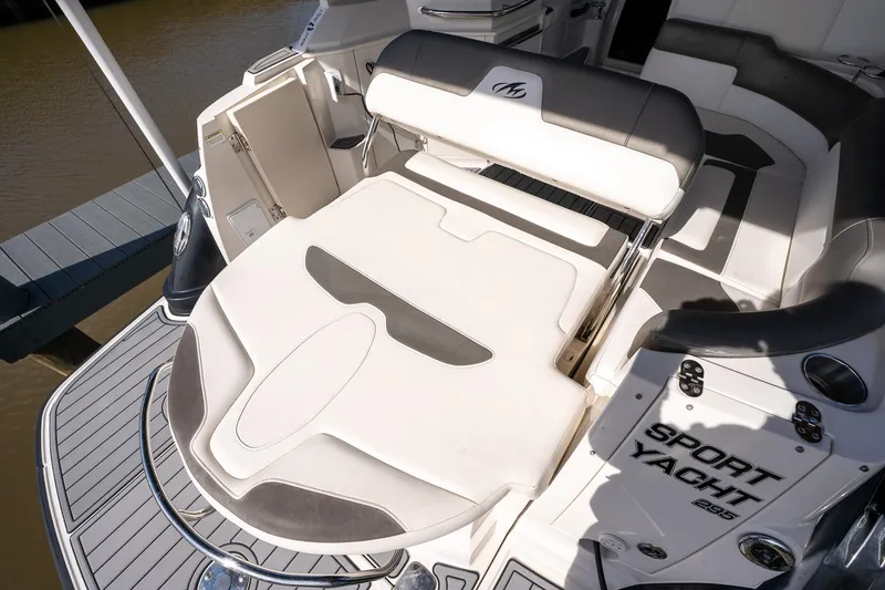 Slide: The Image of 2014 Monterey 295 Sport Yacht with spacious sunpad and sleek design. - 12