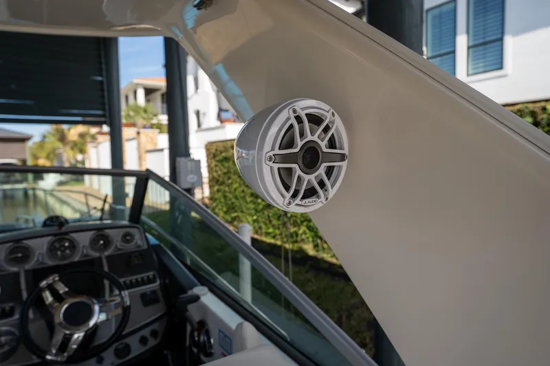 Slide: The Image of Speaker system on 2014 Monterey 295 Sport Yacht dashboard, showcasing modern marine audio. - 25