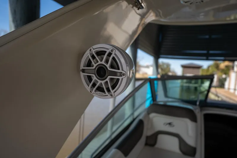 Slide: The Image of Speaker on 2014 Monterey 295 Sport Yacht, interior view with seating and window. - 26