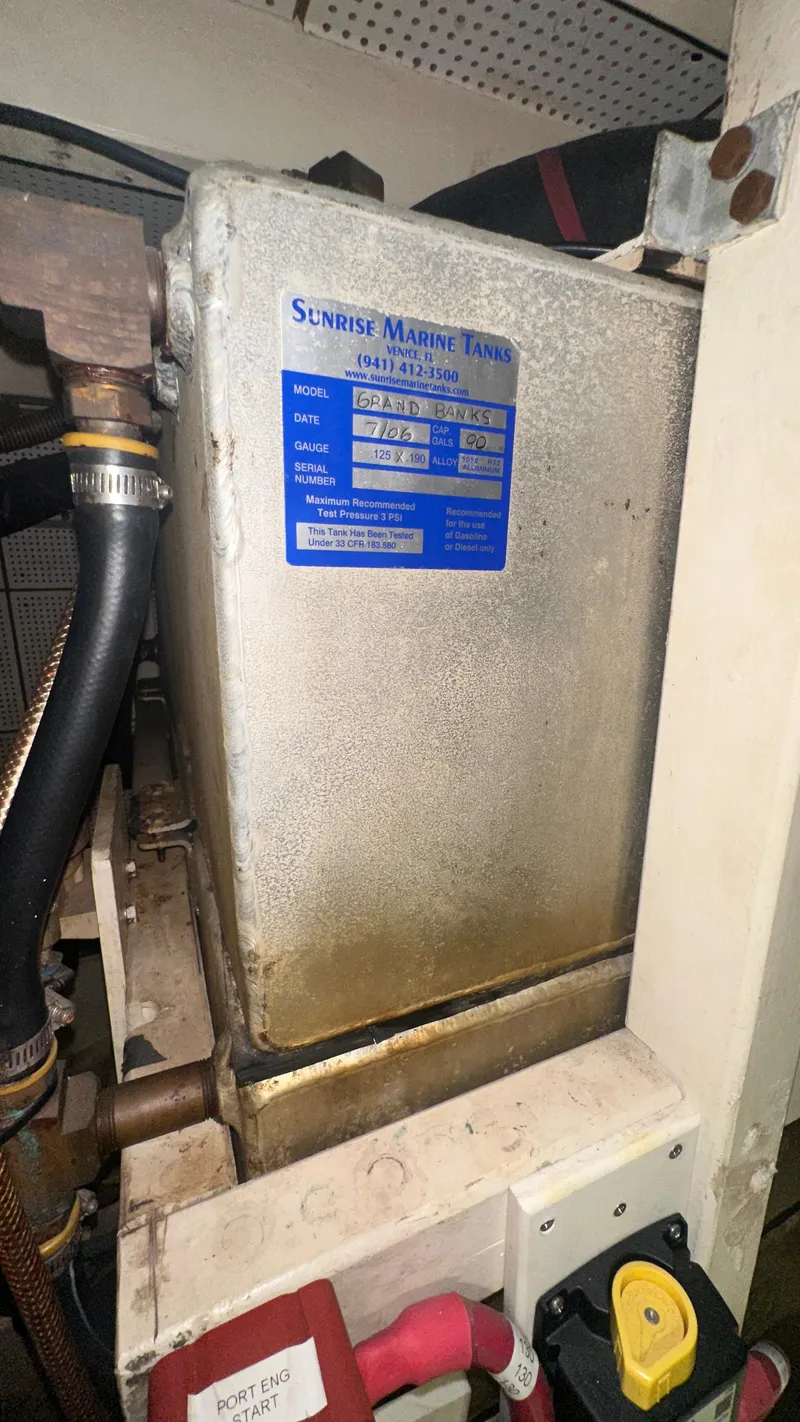 Slide: The Image of Engine compartment of 1987 Grand Banks 46 Classic with marine tank. - 44