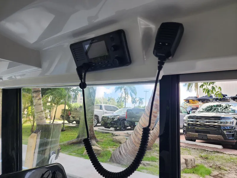 Slide: The Image of Interior view of 2023 Jeanneau NC Sport 895 with radio equipment. - 16
