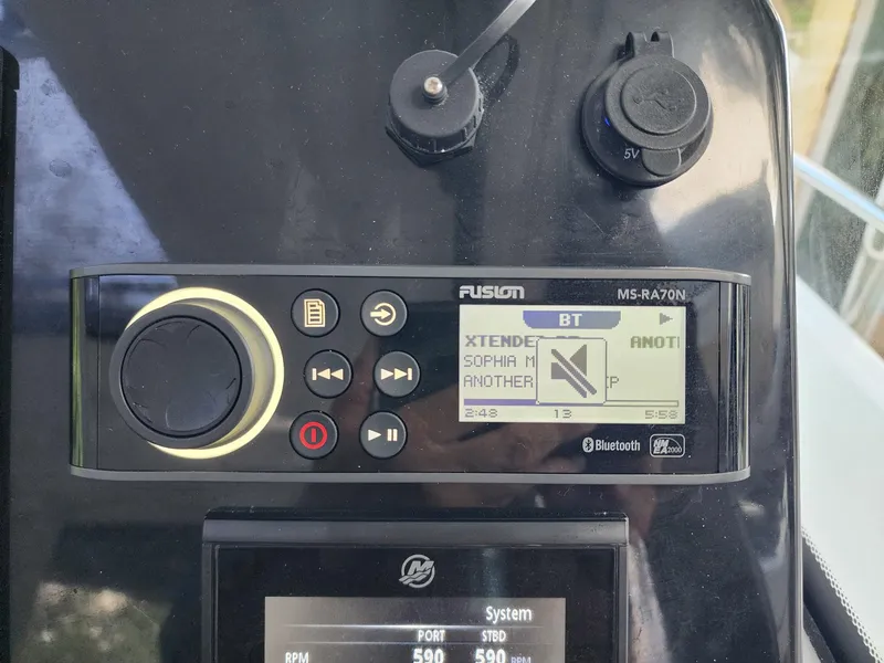 Slide: The Image of Fusion MS-RA70N stereo system on 2023 Jeanneau NC Sport 895 boat dashboard. - 19