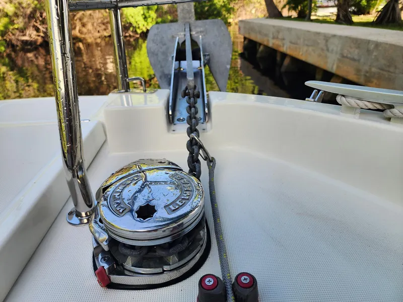 Slide: The Image of 2023 Jeanneau NC Sport 895 anchor system on deck, featuring a robust winch and chain. - 29