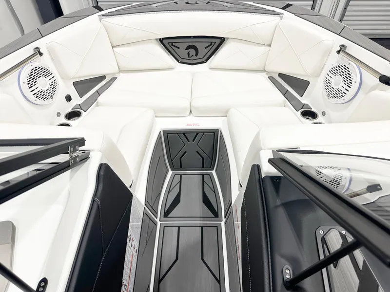 Slide: The Image of Interior of 2025 Centurion NV213 boat with white seating and modern design. - 10