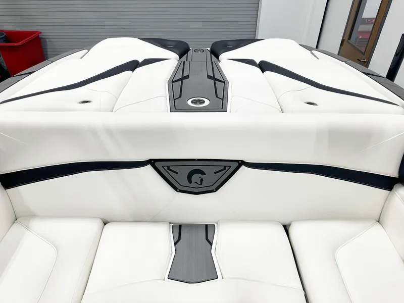 Slide: The Image of 2025 Centurion NV213 boat interior with white and black upholstery. - 6