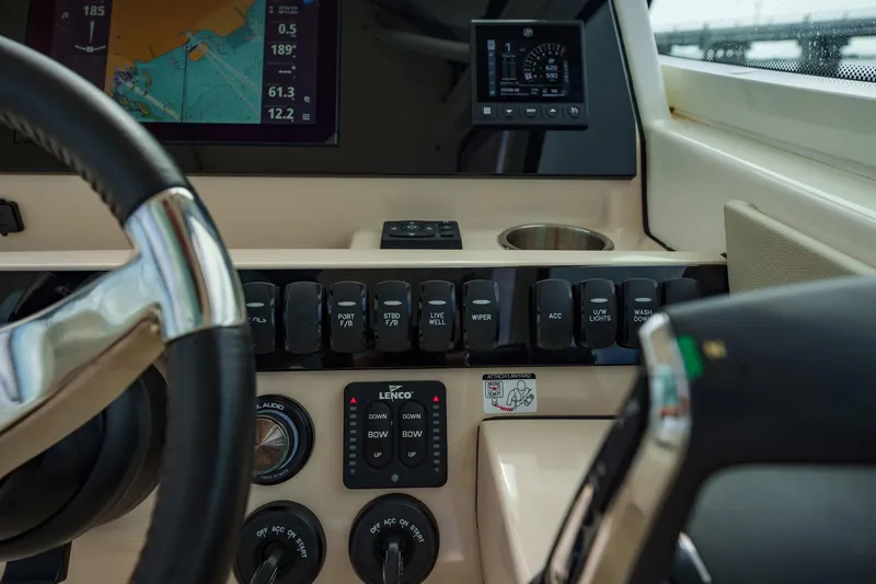 Slide: The Image of Control panel of 2023 Boston Whaler 280 Vantage boat with navigation displays. - 22