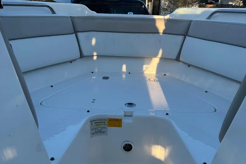 Slide: The Image of 2015 NauticStar 2000 XSDC boat interior with spacious seating and storage area. - 36