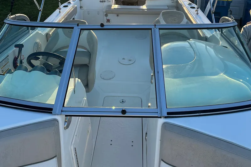 Slide: The Image of 2015 NauticStar 2000 XSDC boat interior with seating and steering wheel. - 39