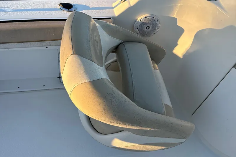 Slide: The Image of 2015 NauticStar 2000 XSDC boat seat with speaker in sunlight. - 40