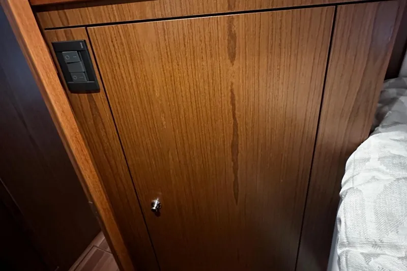 Slide: The Image of Wooden cabinet interior of 2023 Tiara Yachts 43 Open. - 13