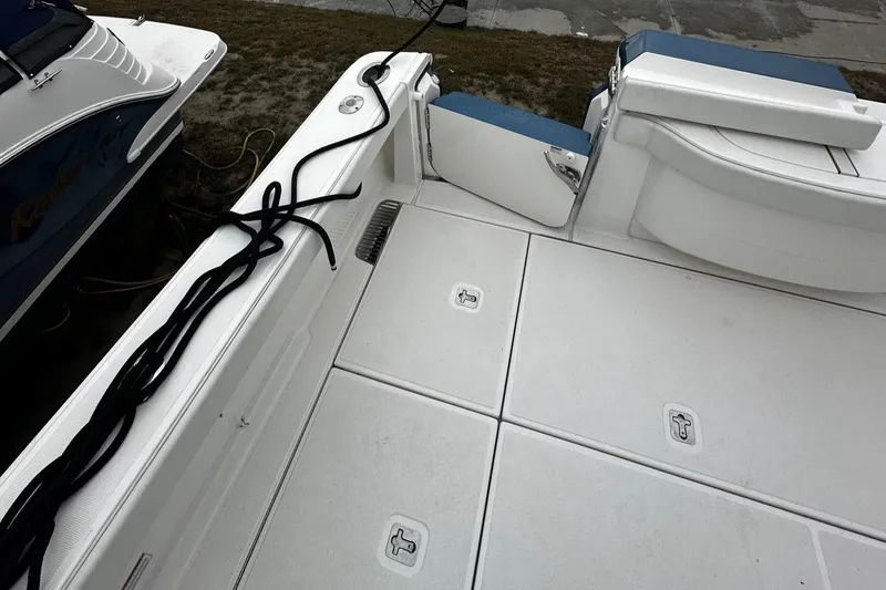 Slide: The Image of 2023 Tiara Yachts 43 Open deck with storage hatches and seating. - 27