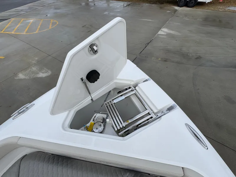 Slide: The Image of 2025 Solace 28 HCS boat with open hatch and ladder on deck. - 23