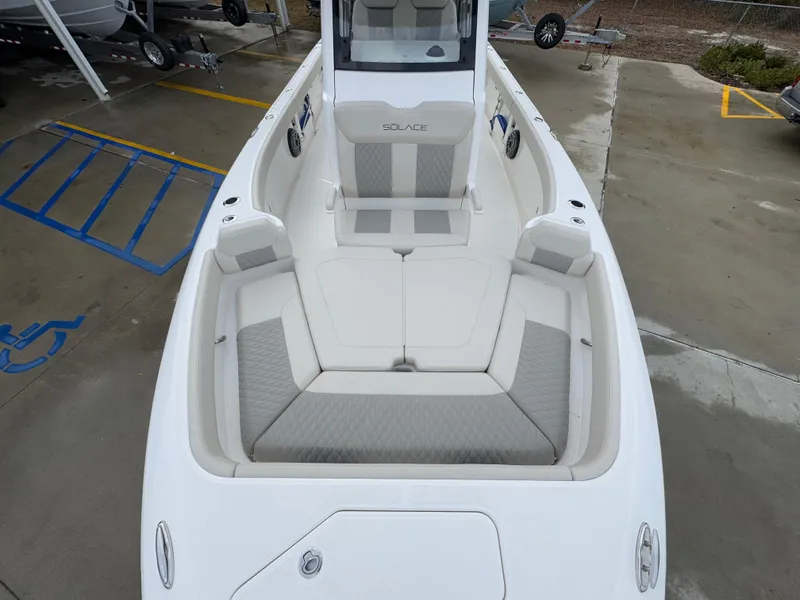 Slide: The Image of 2025 Solace 28 HCS boat with spacious seating and modern design. - 24