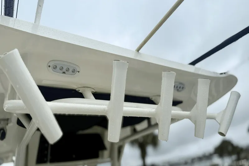 Slide: The Image of Boston Whaler 280 Outrage 2015 boat rod holders and lights on a cloudy day. - 20