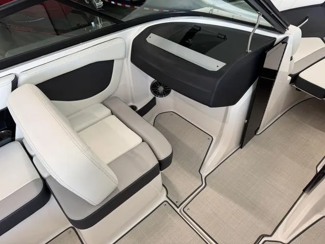 Slide: The Image of 2023 Regal 2000 ES boat interior with modern seating and sleek design. - 14