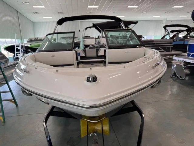 Slide: The Image of 2023 Regal 2000 ES boat displayed indoors, showcasing sleek design and modern features. - 3