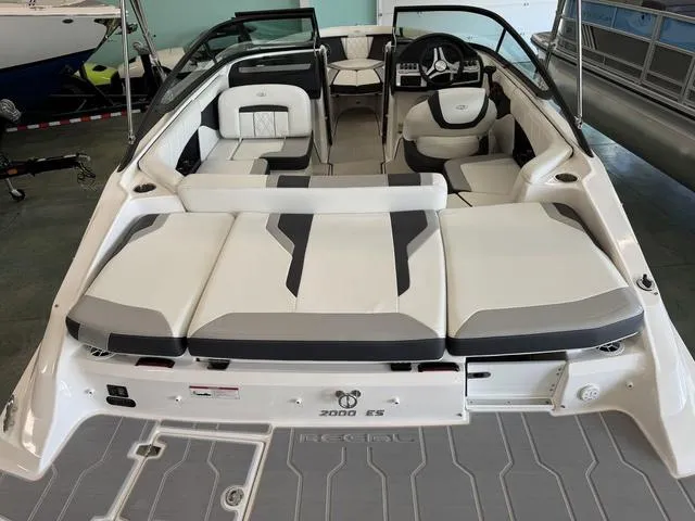 Slide: The Image of 2023 Regal 2000 ES boat interior with sleek seating and modern design. - 6
