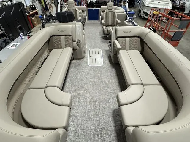 Slide: The Image of 2025 Bennington M Quad Bench 24 MFB interior with luxurious seating and modern design. - 10