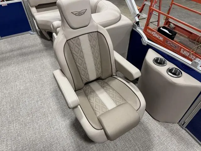 Slide: The Image of Luxurious seating on 2025 Bennington M Quad Bench 24 MFB with cup holders. - 15