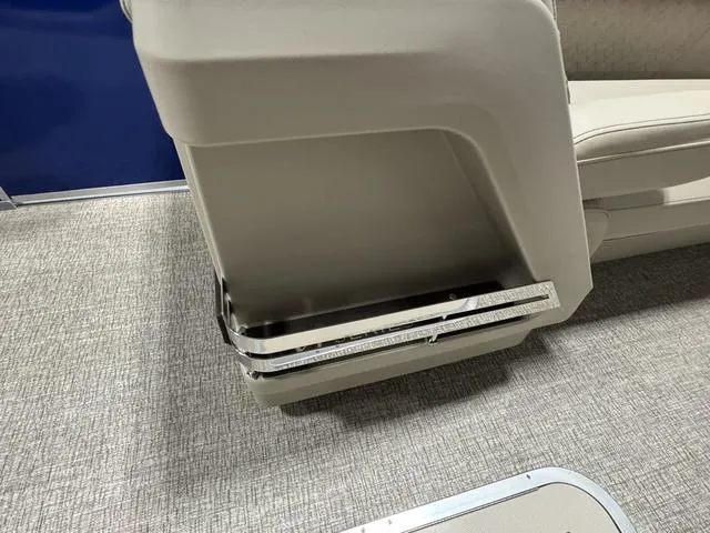 Slide: The Image of Bennington M Quad Bench 24 MFB 2025, beige seating with storage compartment, on a textured floor. - 19