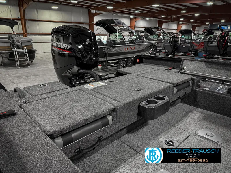 Slide: The Image of 2025 Lund 1775 IMPACT XS SINGLE boat with Mercury engine in showroom. - 30